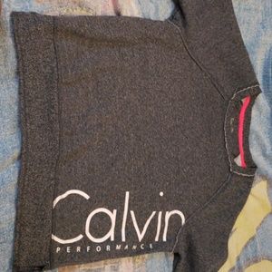 A grey long sleeve Calvin Klein shirt
